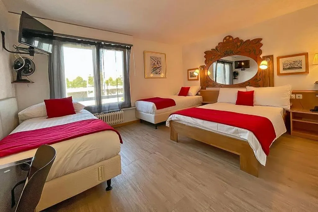 Chambre familiale de l’Hôtel des Alpes à Bulle